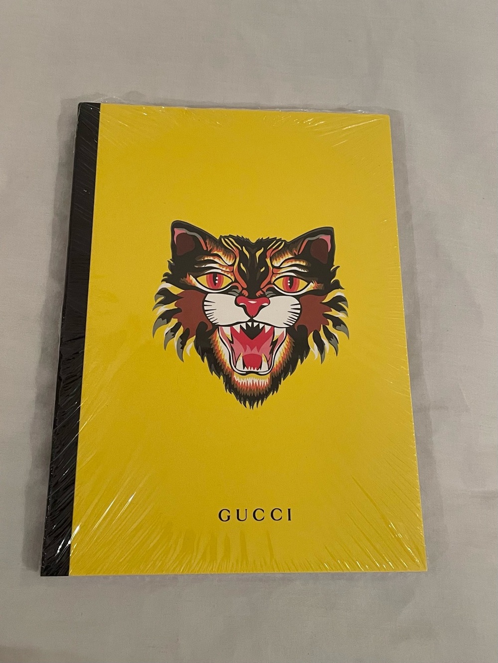 Gucci Yellow Notebook with Fierce Cat Motif